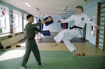 Фото 2003 года. Илона Цветкова (Узлова) с тренером Михаилом Кылвартом.