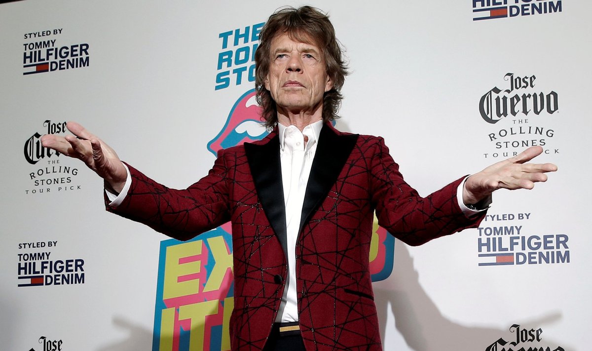 Mick Jagger of The Rolling Stones poses for photographers as the band arrives for the opening of the new exhibit "Exhibitionism: The Rolling Stones" in the Manhattan borough of New York City, U.S.