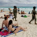 К туристам на пляжах Мексики приставили вооруженную охрану