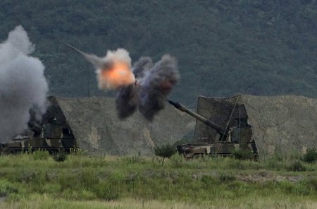 South Korean Marines' K9 Thunder self-propelled guns fire during a military exercise on Baengyeongdo