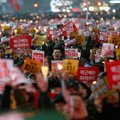 ФОТО и ВИДЕО: Десятки тысяч протестующих требуют отставки лидера Южной Кореи