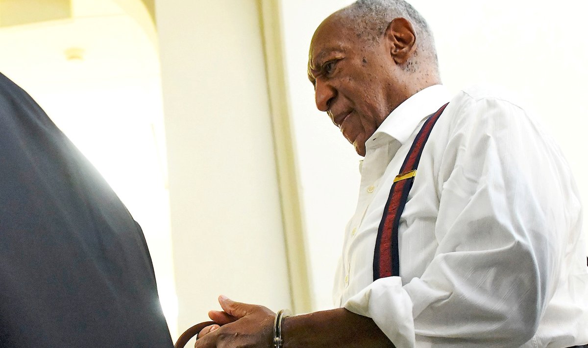 Bill Cosby departs the Montgomery County Courthouse in handcuffs after being sentenced in his sexual assault trial on September 25, 2018 in Norristown