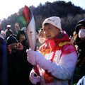 Знаменитый гонконгский актер Джеки Чан принял участие в эстафете олимпийского огня
