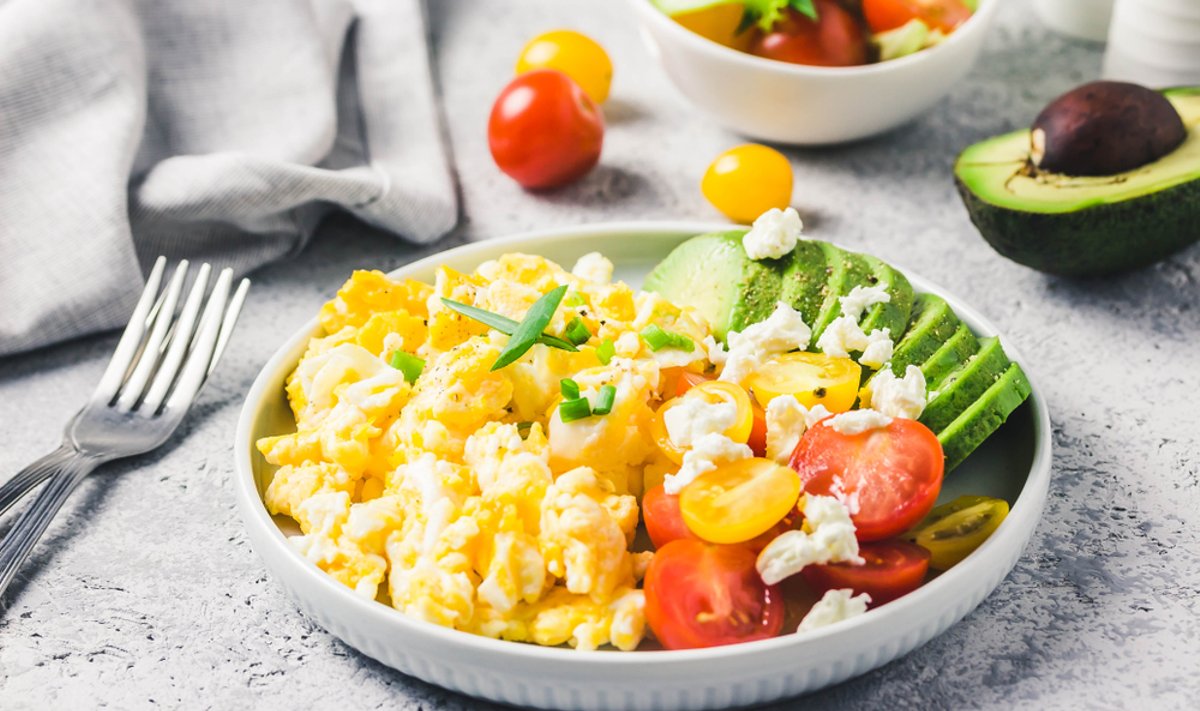Scrambled,Eggs,With,Cherry,Tomatoes,,,Avocado,Feta,Cheese,And