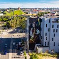 VIDEOD | Eestlane aitas kanda Vilniuses vastuolulise hoone seinale Ukraina-teemalise pildi