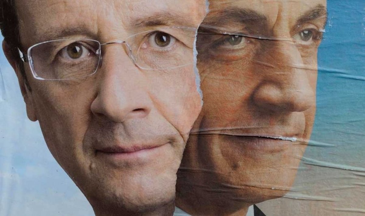 François Hollande’i (vasakul) ja Nicolas Sarkozy teineteise otsa kleebitud valimisplakatid 