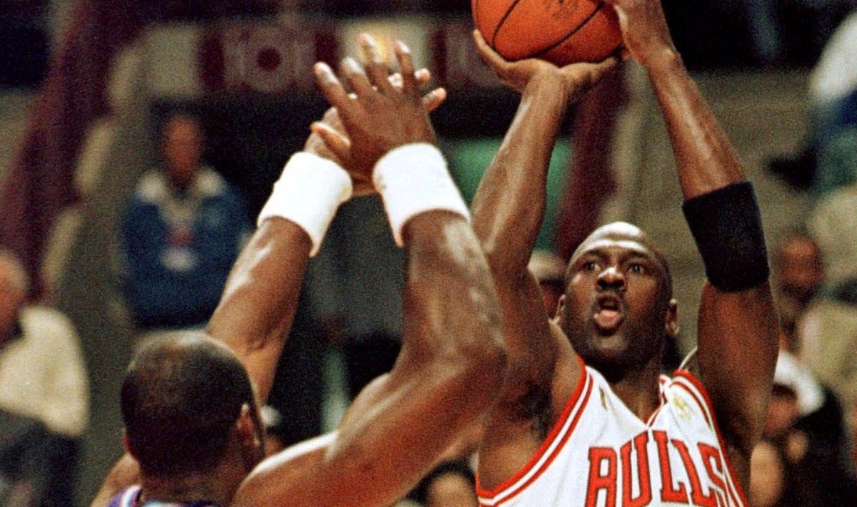 FILE PHOTO: Chicago Bulls' Michael Jordan shoots over Utah JazzÕs Karl Malone during the first period of the second game of the NBA Finals at the United Center, Chicago.