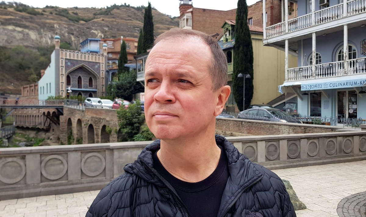 Lawyer Ivan Pavlov poses for a picture during an interview in Tbilisi