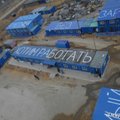 Рабочие космодрома Восточный оставили послание Путину на крышах
