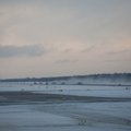 Tihe lumesadu pani lennukid Tallinna lennujaama kohal tiire tegema