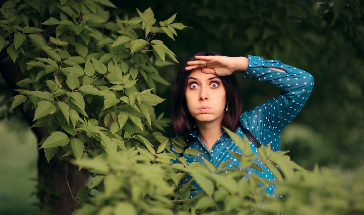 Curious,Jealous,Woman,Spying,From,Bushes.,Funny,Undercover,Girl,Stalking