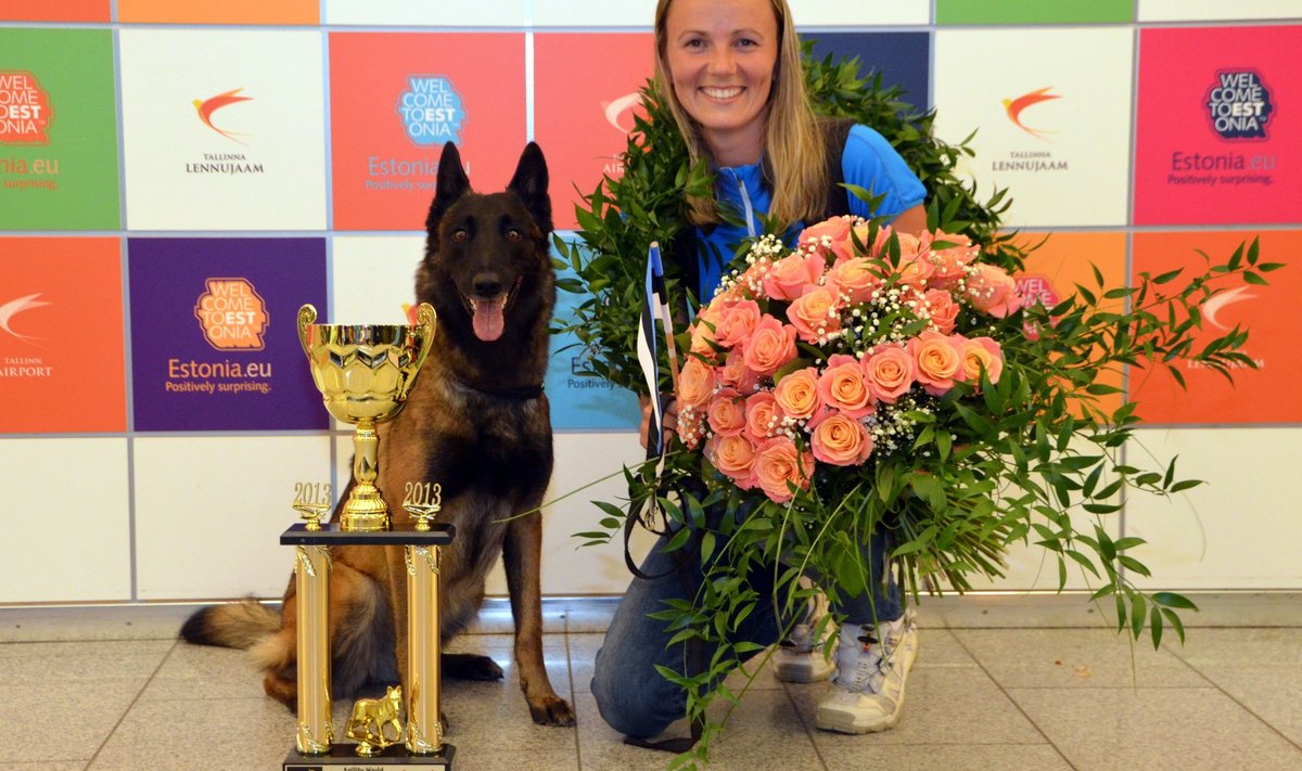 Marje Piiroja ja koer Süsi koos MMi võidukarikaga