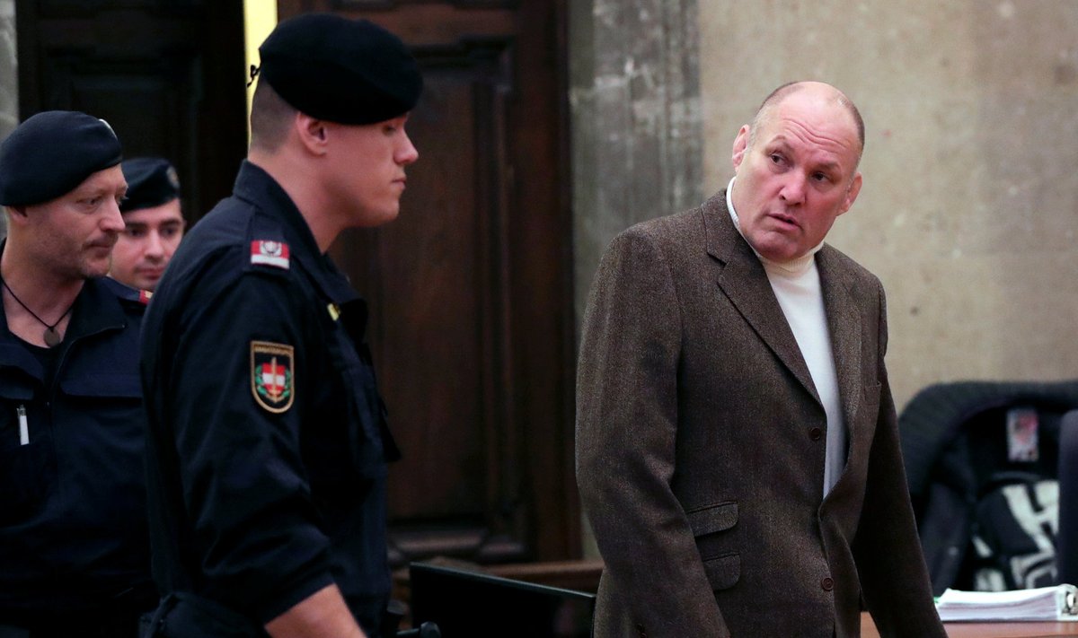 Former Austrian two-time Olympic judo champion Peter Seisenbacher arrives for his trial at a court in Vienna