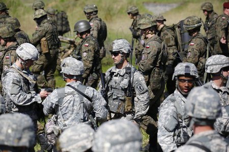 Paratroopers from the U.S. Army's 173rd Infantry Brigade Combat Team participate in training exercises with the Polish 6 Airborne Brigade soldiers in Oleszn