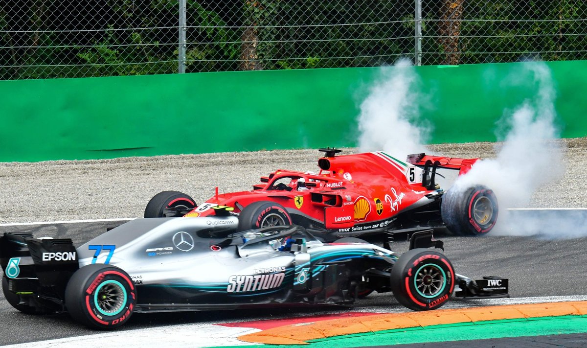 Pärast kerget kokkupõrget pööras Sebastian Vetteli Ferrari oma nina vastassuunda.