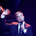 FOTO I Omapärane tätoveering: Robbie Williams sidus end igaveseks Roger Moore'iga